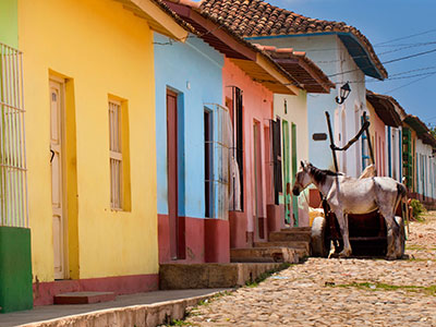 Row of colorful houses in Trinidad at Cuba